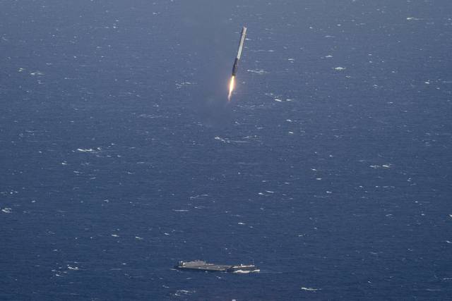 SpaceX rocket booster landing on ocean drone ship
